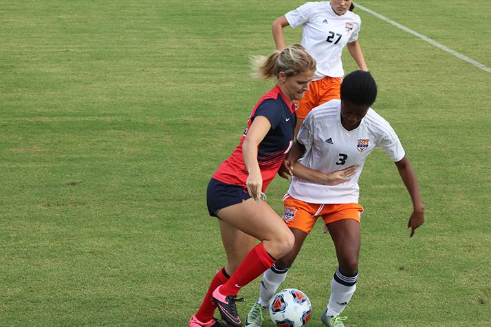 American River College forward Savannah Watson battles with Cosumnes River College defender Taylor Thomas during a game on Oct. 28, 2016. ARC lost 2-0. (Photo by Mack Ervin III)
