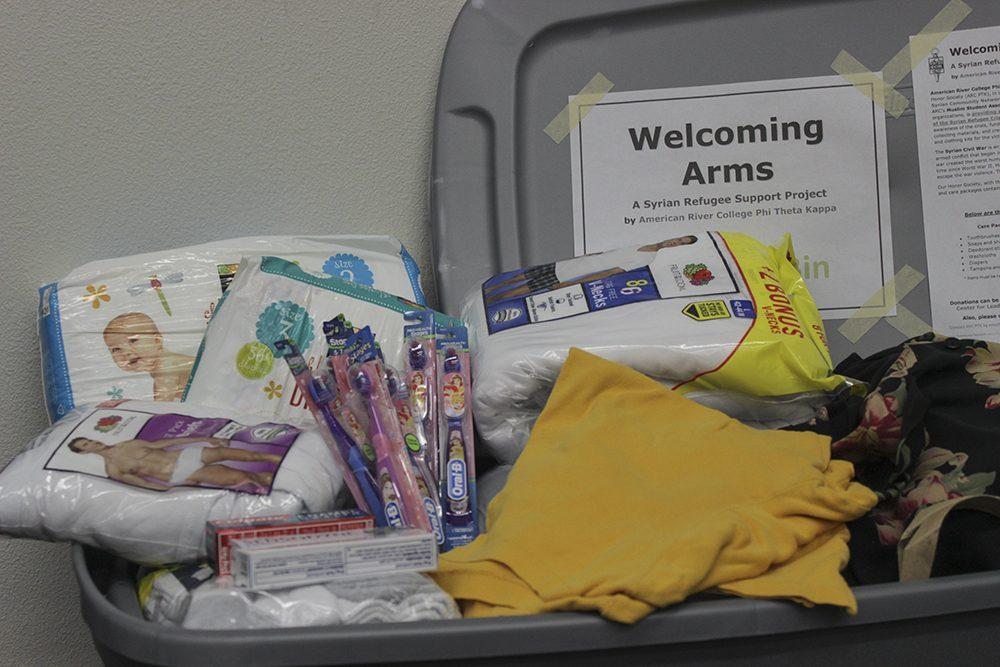 The Phi Theta Kappa Welcoming Arms project donation bin sits in the Center for Leadership and Development. PTK is accepting donations through the end of the semester. (Photo by Hannah Darden)