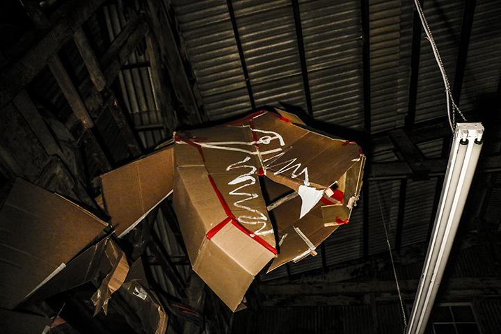 The life size cardboard T-Rex created by John Klaiber for his "Zoo Time" exhibition at the Panama Art Factory on Nov. 12. (Photo by Luis Gael Jimenez)