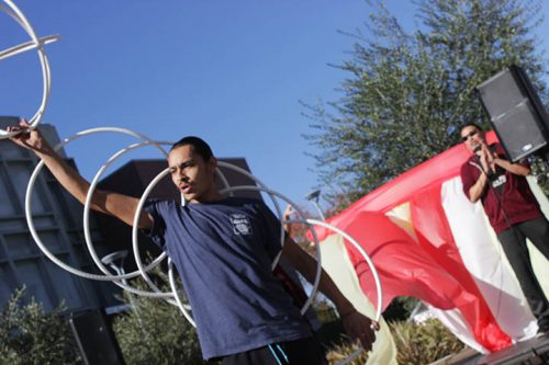 Indigenous choreographer and performer, Micco Sampson, performs at ARC in the quad. He performed hoop dancing, which is a traditional form of dancing that has been passed down in many Native American tribes. (Photo by Cheyenne Drury)