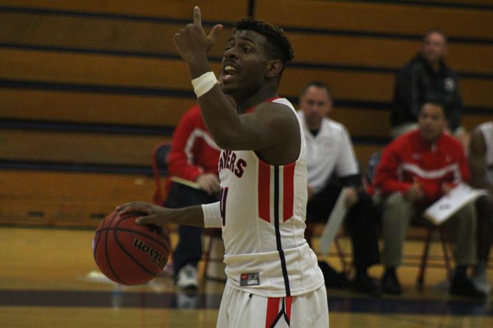 American River College guard Jermaine Henderson shouts instructions to his teammates during a game against Santa Rosa Junior College on Jan. 27 at ARC. ARC won 68-57 to get its 12th win of the season. (Photo by Mack Ervin III)