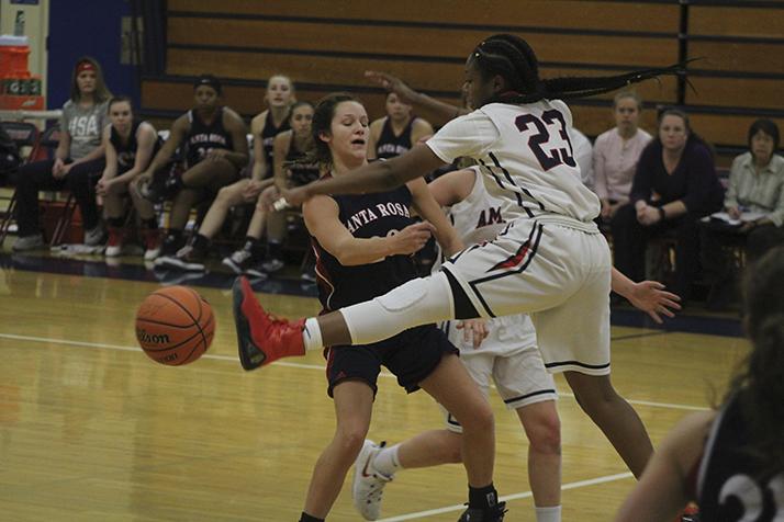 American River College guard Alana Myers blocks a pass during a game against Santa Rosa Junior College on Jan. 27. The Beavers picked up their 15th win of the season 62-44. (Photo by Mack Ervin III)