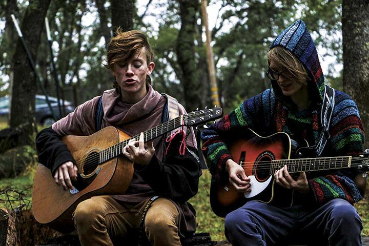 Bryce Mondul (left) and Justin Carter practice one of their songs at Georgio Klironomos' ranch in Placerville, California on Oct. 27, 2016. (Photo by Luis Gael Jimenez)