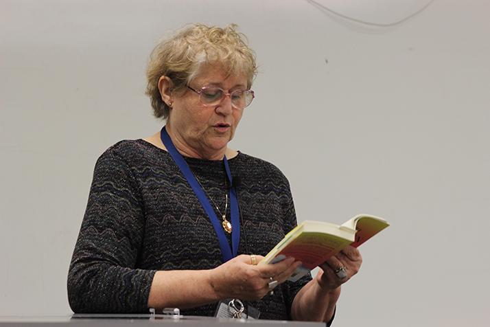 Author and ARC English professor, Lois Ann Abraham reads a passage from her novel “Tina Goes to Heaven during a College Hour speech on March 9, in Raef Hall room 120. Abraham has been published twice before both works by ARCs publication Ad Lumen Press. (Photo by Mack Ervin III)