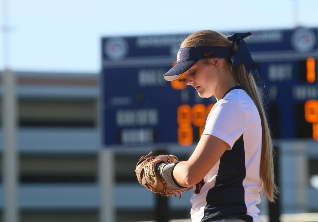 ARC softball infield Sierra Cryderman stands on the field during the game. (Photo Gallery by Lidiya Grib)