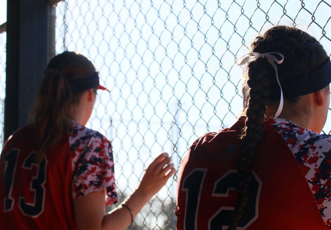 Santa Rosa Junior College teammates Elizabeth Brown and Haley Millerick look out at the game. (photo gallery by Lidiya Grib)