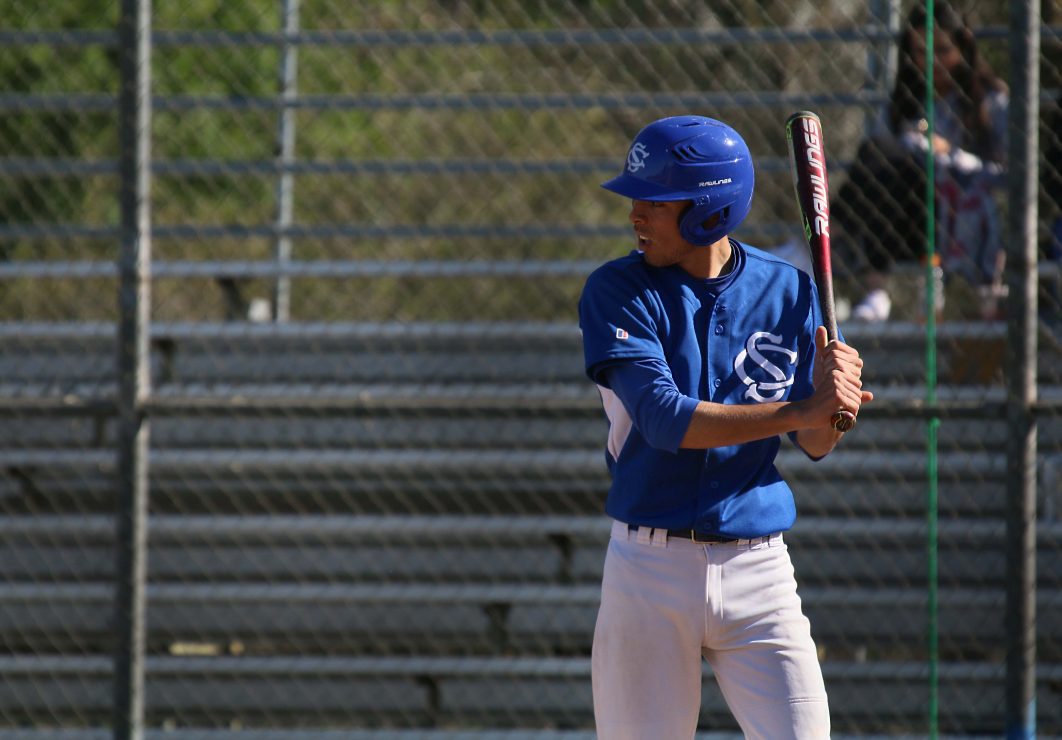 Solano Colege player prepares to hit the ball.