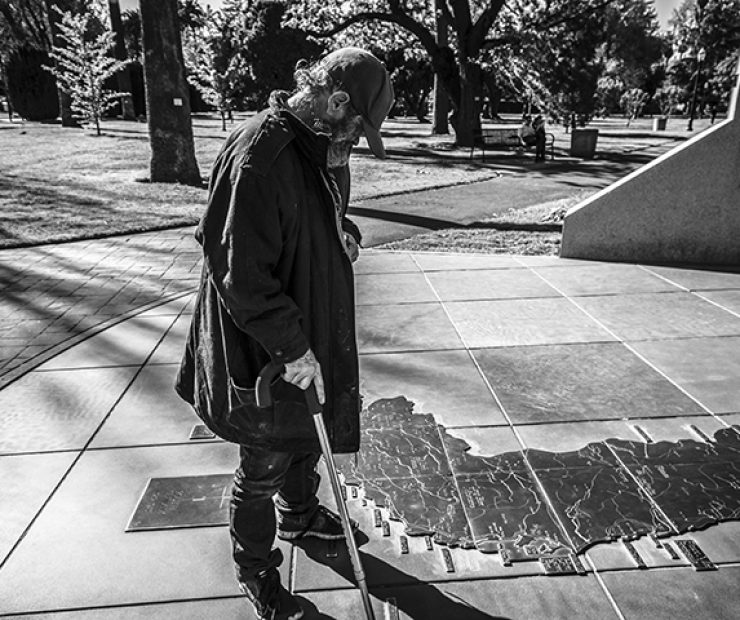 Larry Gene King stands over a map of Vietnam at the California Vietnam Veterans Memorial in Sacramento, California on March 31. King served two tours in Vietnam and was captured and held in the Mekong Delta as prisoner of war for an undisclosed amount of time. (Photo by Luis Gael Jimenez)