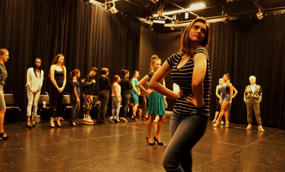 Fashion show model casting held on March 24 in the Arts and Science building. The model, Alexis Wilson is posing in the forefront. 
(Photo credit Sara Durrant)