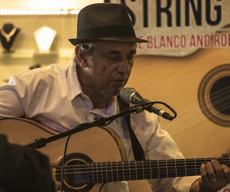 Flamenco guitarist Jose Blanco performs at the Koreana Plaza International Market in Sacramento, California on April 29. Born in Spain, Blanco has been performing music for over 30 years and has had music featured in radio, television and film. (Photo by Luis Gael Jimenez)
