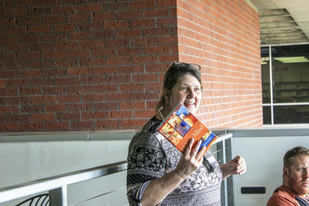 Professor Heidi Bennett adresses the New Faculty Academy about the next reading assignment, Learning and Leading With Habits of Mind, by Costa & Kallick. (Photo by Brienna Edwards)