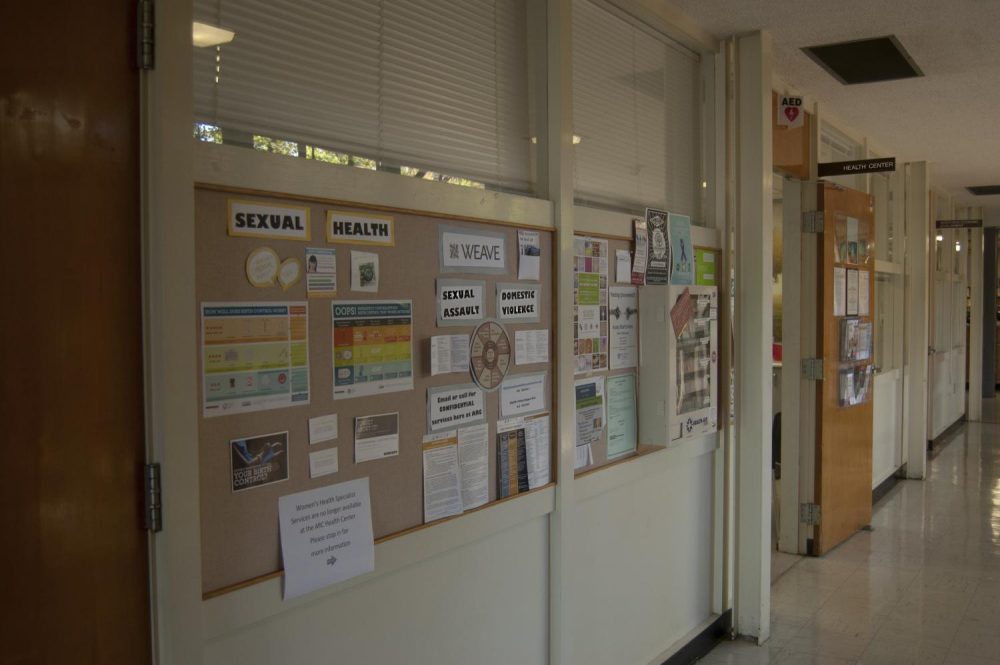 The Bulletin Board outside the on campus Health Center, describing the difference between sexual violence and domestic violence, and other services offered. (Photo by Brienna Edwards)