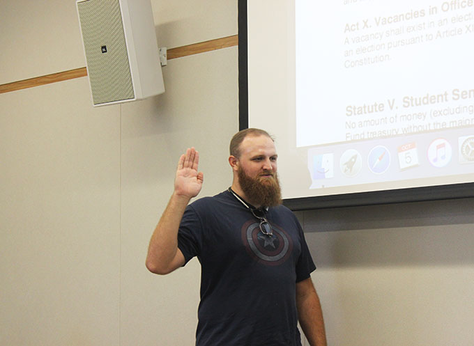 Student Senate Vice President Earl Crouchley III being sworn in at the October 5, 2017 Student Senate meeting. (Photo by John Ennis)