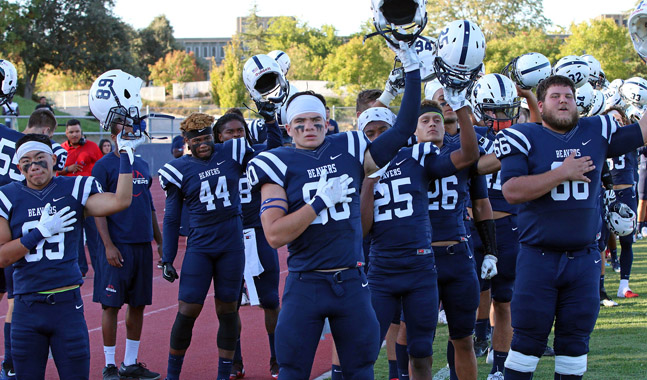 The+American+River+College+Football+team+salutes+during+the+National+Anthem+before+a+home+game.+%28Photo+courtesy+of+Joe+Eiers%29