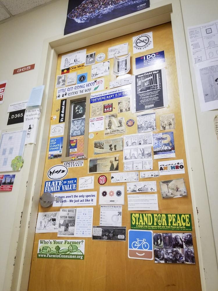 The door of Professor Kristina Casper-Denmans office disrupts the monotony on the Davies Halls third floor with its collection of inspirational quotes and various stickers at American River College on Nov. 6. (Photo by Ashley Hayes-Stone)