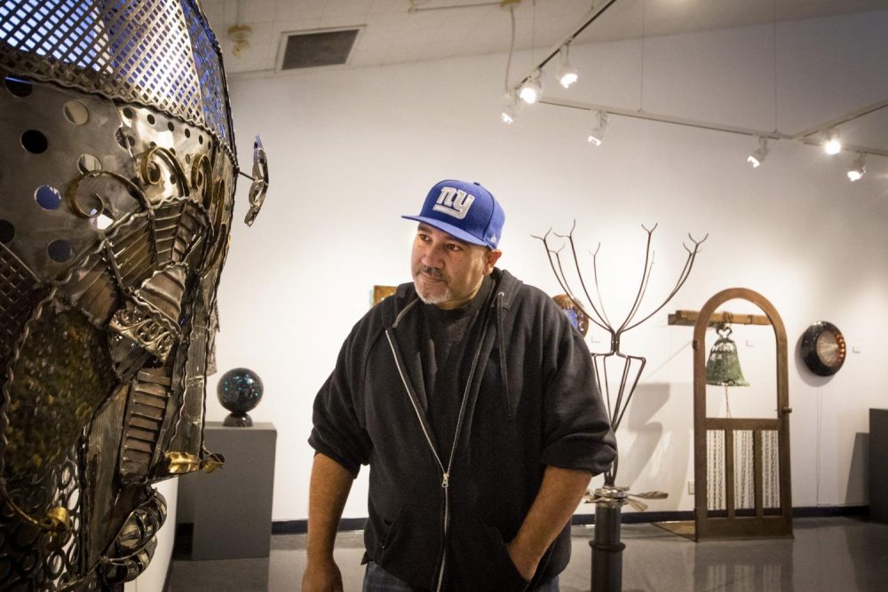 Manuel Marmolejos looks at the art piece Anna in the Kaneko Gallery at American River College on Nov. 29, 2017. (photo by Ashley Hayes-Stone)