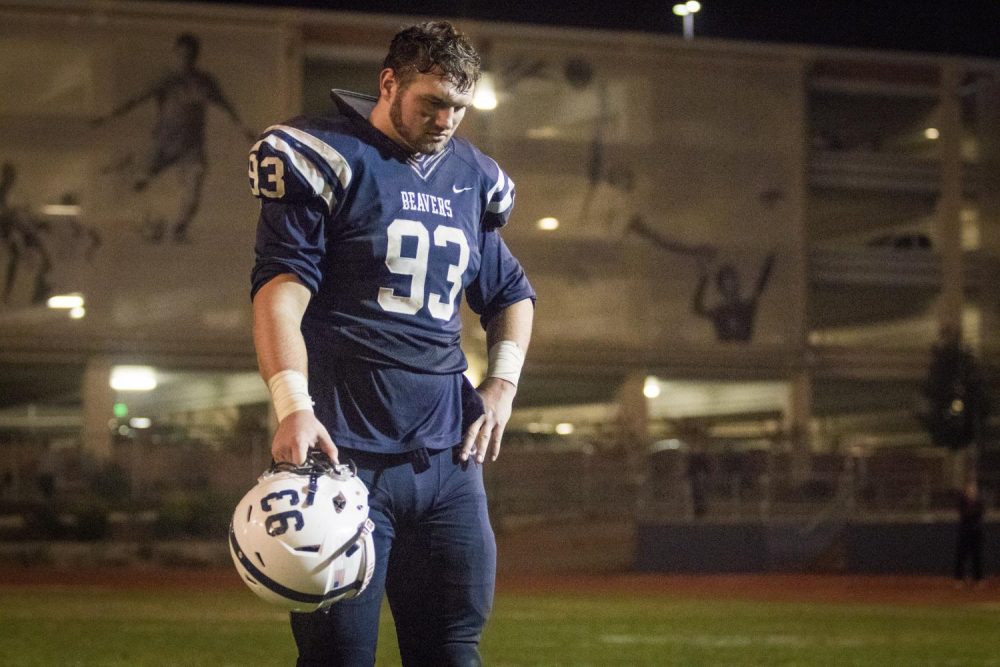 Defensive tackle Caleb Tremblay stands on the sidelines after the loss against San Mateo at American River College on Nov. 25. (Photo by Ashley Hayes-Stone)