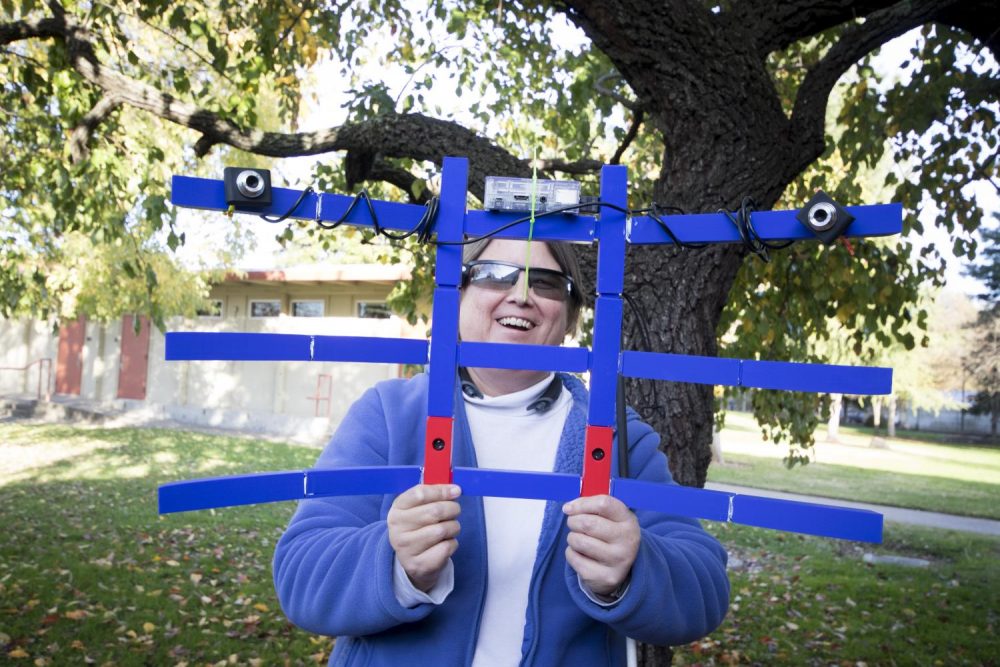 Tiffany Manosh poses with her special made camera created by the Design Hub at American River College on Nov. 28. (Photo by Ashley Hayes-Stone)