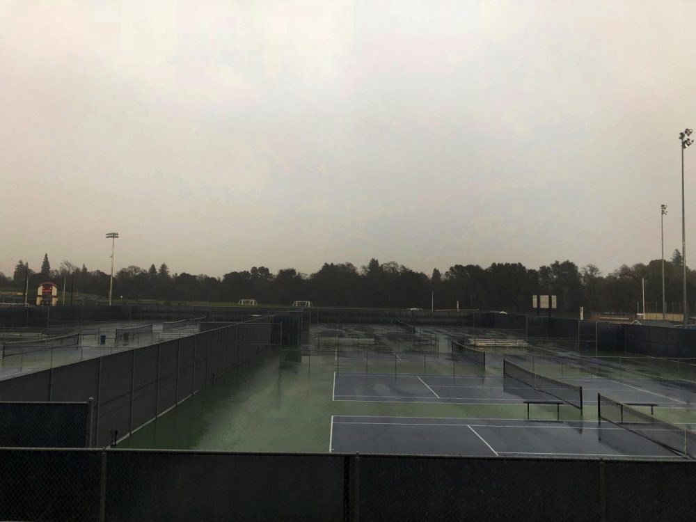 Grey skies looms over the tennis courts at American River College on Feb. 26. (Photo by Alonda Botello)