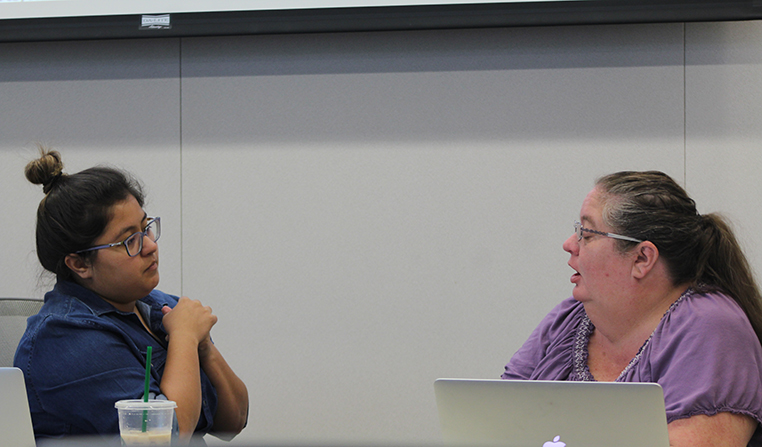 Associated Student Body (ASB) President Deborah Hernandez consults with Parlimentarian Tamara Dunning duing a Student Senate meeting on April 27 at American River College. (Phto by Mack Ervin III)