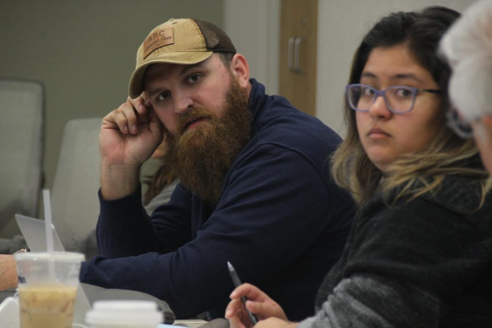 Vice President Earl Crouchley III (left) and President Deborah Hernandez look on as someone speaks during an April 6 ASB meeting. (Photo Mac Ervin III)