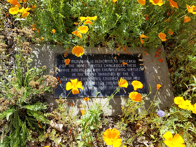 A plaque dedicated to the memory of the “Challenger” space shuttle crew lies outside of the Engeneering and Physics department on April 3 at American River College. (Photo by Mack Ervin III)