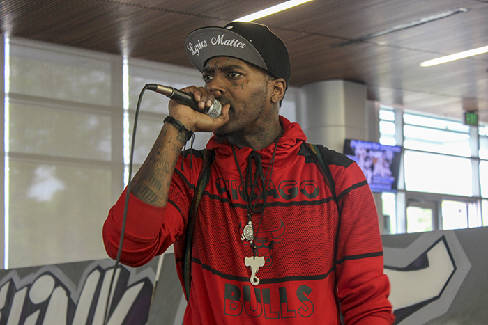 Aurellius the Siant performs at American River Colleges artivism event on April 18, 2018. ARCs UNITE program invited Aurellius to lecture on the importance of words on April 17 and to perform at their artivism event the next day. (Photo by Jennah Booth)