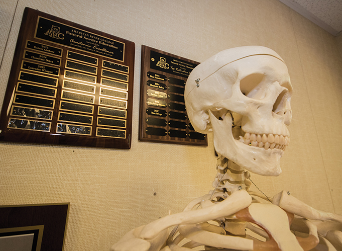 The anatomical skeleton stands in the funeral service education classroom on April 30, 2018. (Photo by Ashley Hayes-Stone)