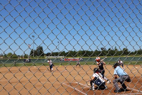 American River College pitcher Zinnia Thewlis pitches to a Cosumnes River College player on April 21. ARC won 10-2. (Photo by Alondra Botello)