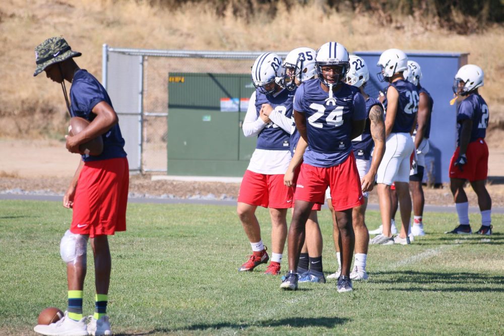 American River College fooball defensive backs look on at practice before their first game on Saturday, Sep. 1. (Photo by Jennah Booth)