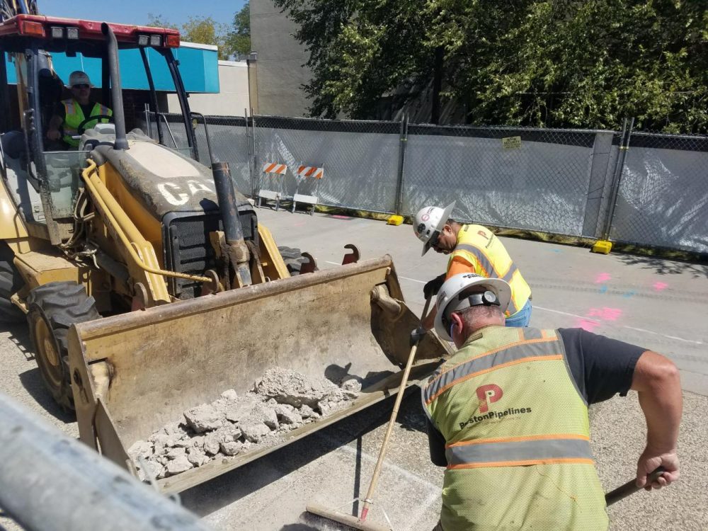 The construction workers begin revamping the path that leads to Portable Village at American River College on Aug. 28, 2018. (Photo by Ashley Hayes-Stone)