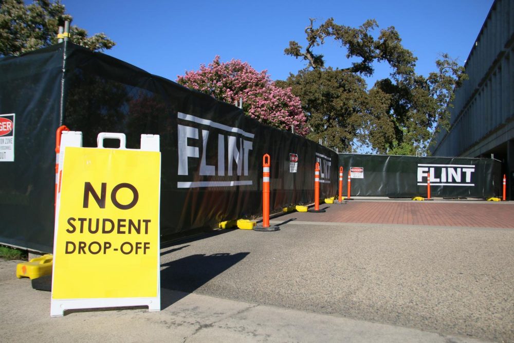 Half of American River Colleges staff parking lot E is fenced off on August 30, 2018, due to the demolition of the old Liberal Arts building. The demolition will make way for the construction of a new Science, Technology, Engineering and Mathematics (STEM) facility. (Photo by Jennah Booth)