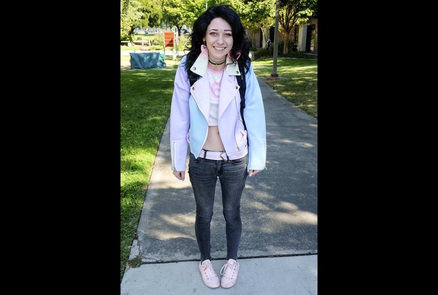 Psychology major, Julia Dimant wears a bright blue and pink jacket and pink shoes with pink earrings at American River College on Aug. 28. “I like the unique clothing styles and elegance [in anime] and it kind of stands out to me. It’s an inspiration,” Dimant said. (Photo by Patrick Hyun Wilson)