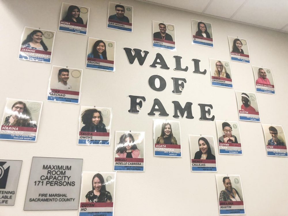 Photos of former student workers hang on the wall in the HUB at American River College on Oct. 2, 2018. (Photo by Alexus Hurtado)