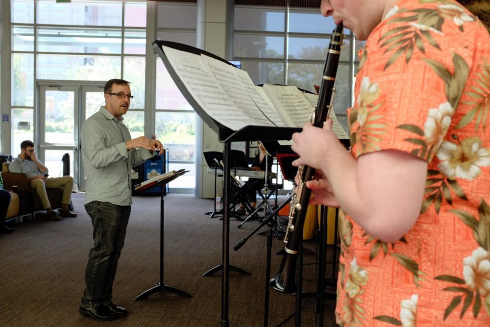 Dyne Eifertsen leads the American River College Latin Jazz Ensemble in the Student Center on Oct. 11. (Photo by Patrick Hyun Wilson)
