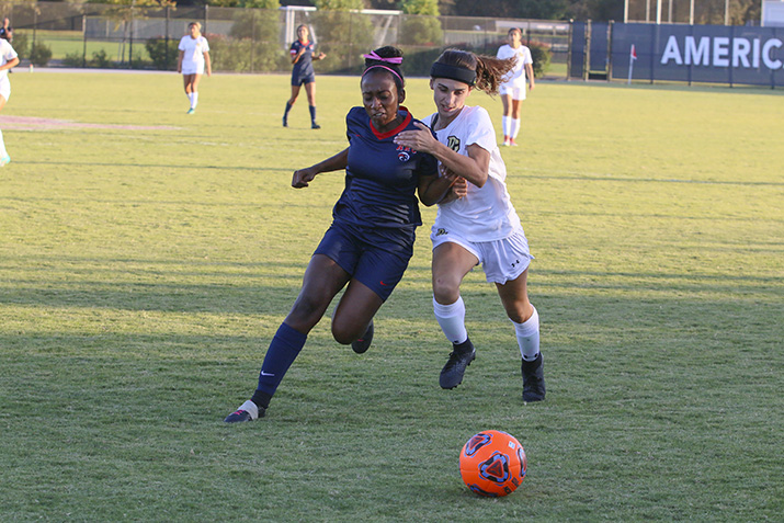 American River College forward Kaliyah Bayless races a San Joaquin Delta player down line towards ARC’s goal on Oct. 19, 2018. ARC lost the game, 2-0. (Photo by Jennah Booth)