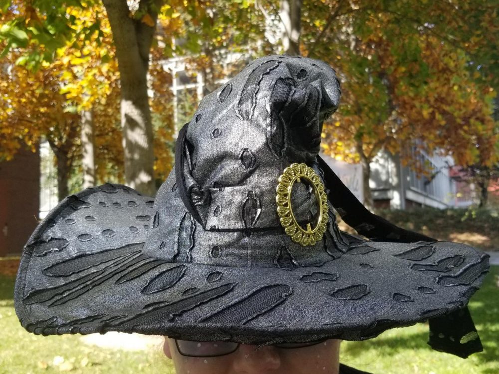 A student dresses as a witch for Halloween at American River College on Oct. 31, 2018. (Photo by Patrick Hyun Wilson)