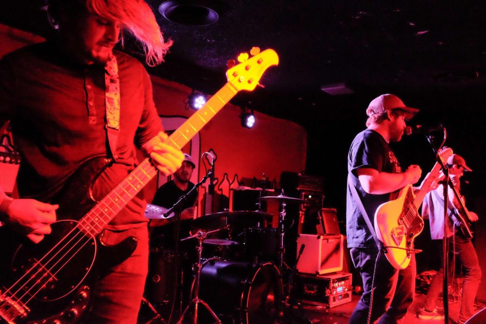 Demon In Me features (from left to right) ARC alumnus Julian Grenz, drummer Ciro Abraham and singer guitar player Kylle Reece, during a show at Holy Diver in Sacramento on Sept. 23. (Photo by Patrick Hyun Wilson)