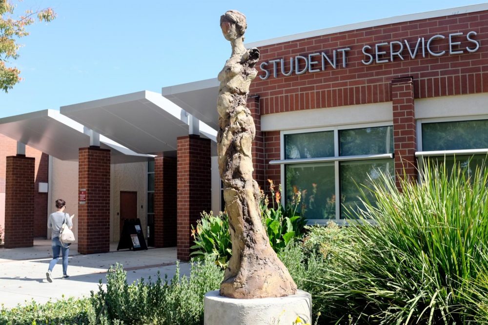 The Student Services building on the American River College campus has workers ready to help students navigate the application process for the California College Promise program on Oct. 2, 2018. (Photo by Patrick Hyun Wilson)