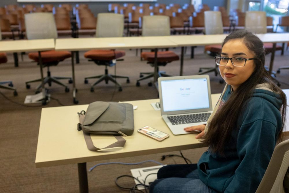 Student Senate president Rebeca Rico-Chavez sits in the empty meeting room where, ASB meets each week on Nov. 6, 2018. (Photo Illustration by Patrick Hyun Wilson) 