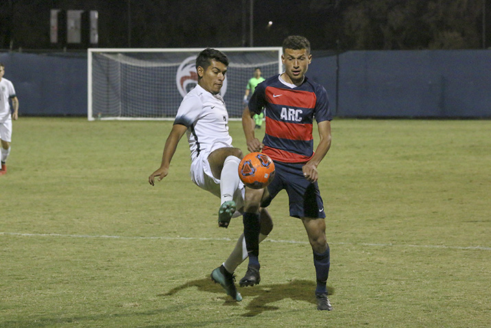 American River College player Santiago Moreno fights to trap the ball from a Folsom Lake College player at a home game on Nov. 6, 2018. ARC lost to FLC, 2-0.  (Photo by Jennah Booth)