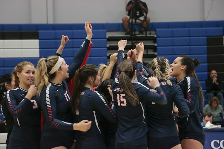 The+American+River+College+volleyball+team+celebrates+their+3-1+win+against+El+Camino+College+in+the+quaterfinals+of+the+CCCAA+State+Chmpionship+tournament+at+Solano+College+on+Nov.+30%2C+2018.+ARC+moved+on+to+place+first+in+the+tournament.+%28Photo+by+Jennah+Booth%29