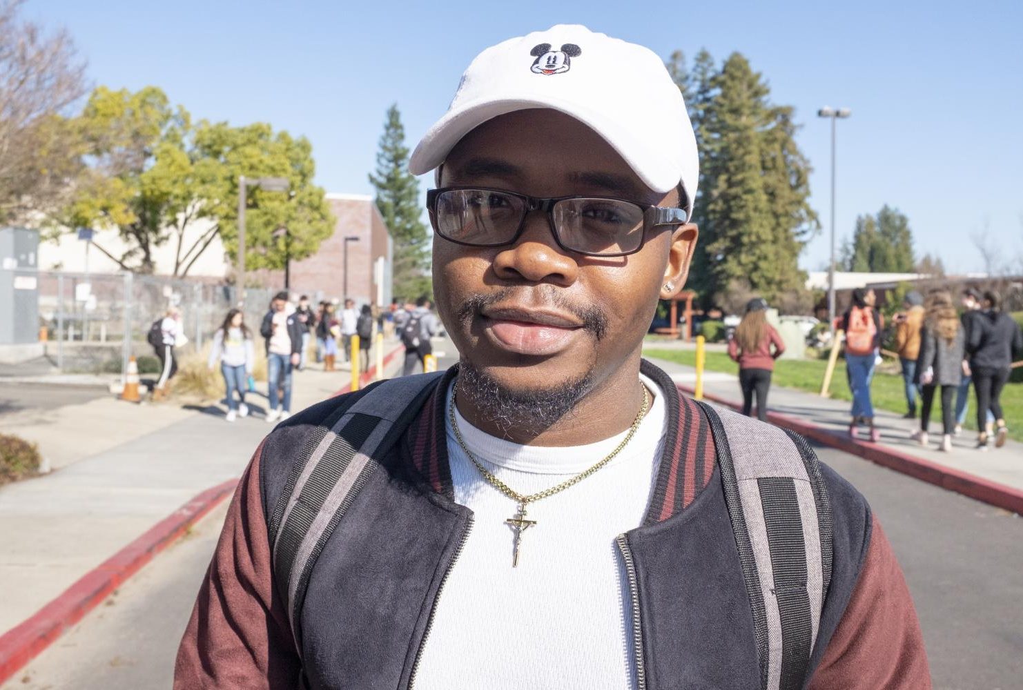 ulius Gbana | Nursing Major  “Basically this new building right here is irritating because you have to go around to go to the library and stuff like that. … Since last semester they put this barrier in right here and I think that’s why people started going around to go to the library.”