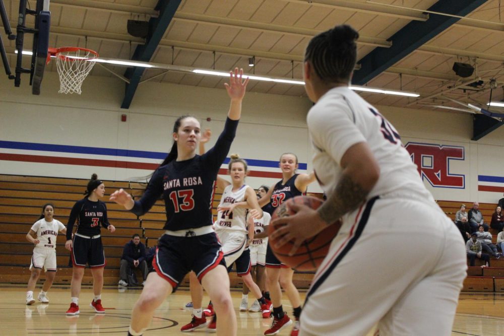 American River Guard Deja Samuels attempts to shoot the ball against Santa Rosa College. ARC lost 57-53. (Photo by Emily Mello)