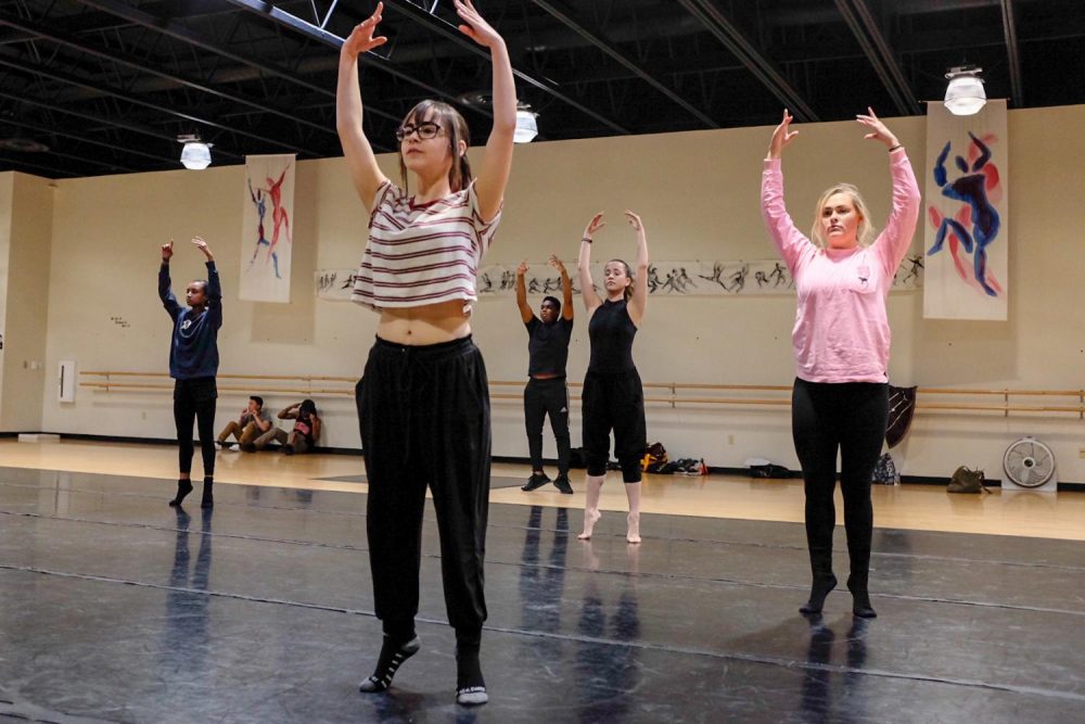 Students in the Dance Production Studio & Stage class warm up before choreographing routines for the class in the dance studio, on Feb. 06, 2019. (Photo by Patrick Hyun Wilson)