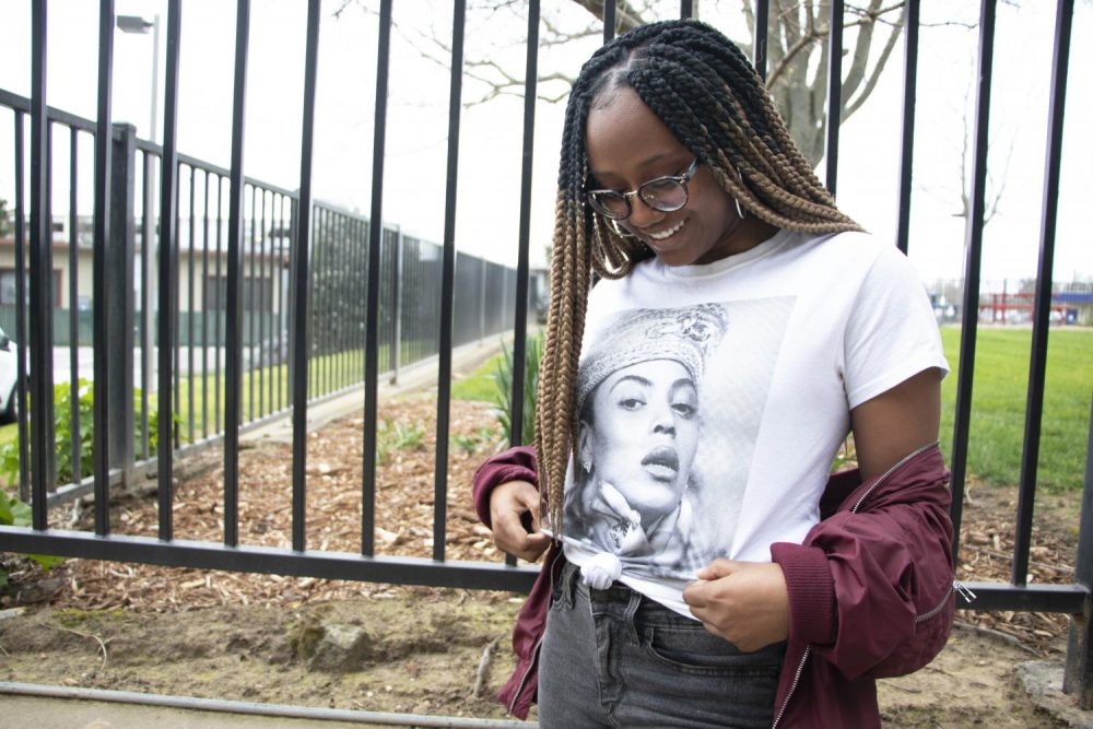 Social Media Editor Alexis Warren wears a Beyonce shirt to honor her as one of the black icons that Warren looks up to during Black History Month on Feb. 25, 2019. (Photo by Ashley Hayes-Stone)