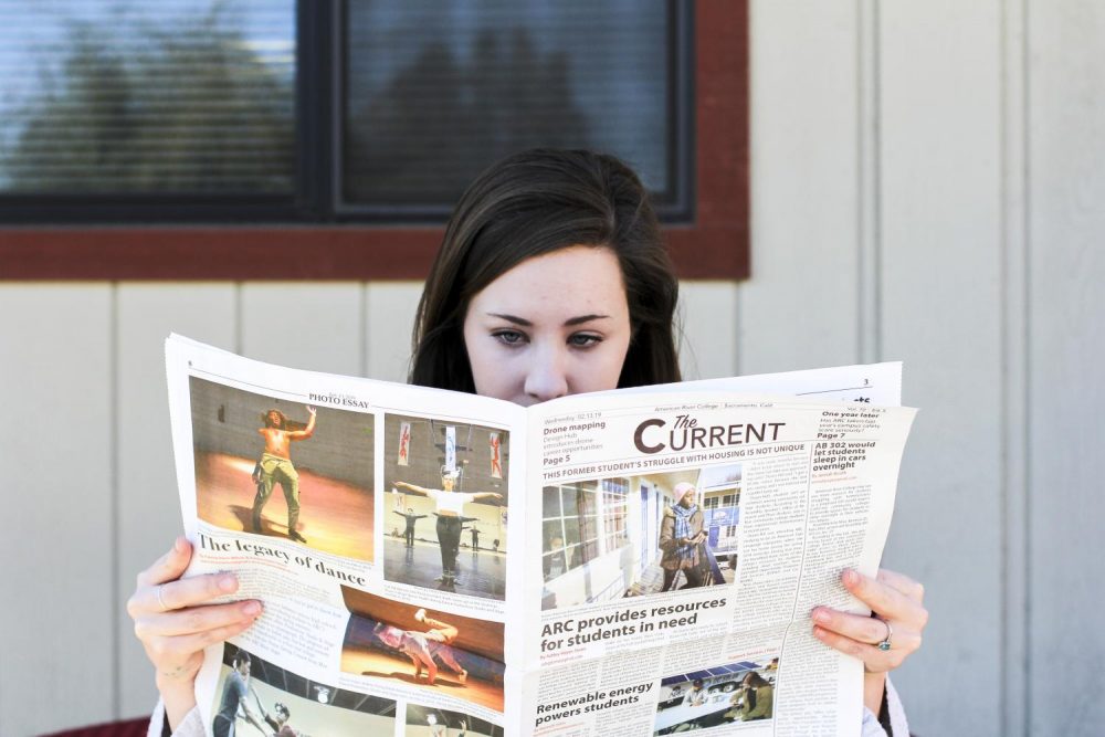 Ariel Casper keeps up with what’s happening on campus, reading news that affect students, faculty and staff. (Photo illustration by Katia Esguerra)