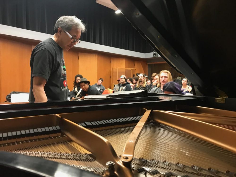 Chair of the music department Eric Chun teaches students how to write chord progressions during his songwriting class, MUSM 120, on Feb. 25, 2019 at American River College. (Photo by Ariel Caspar)