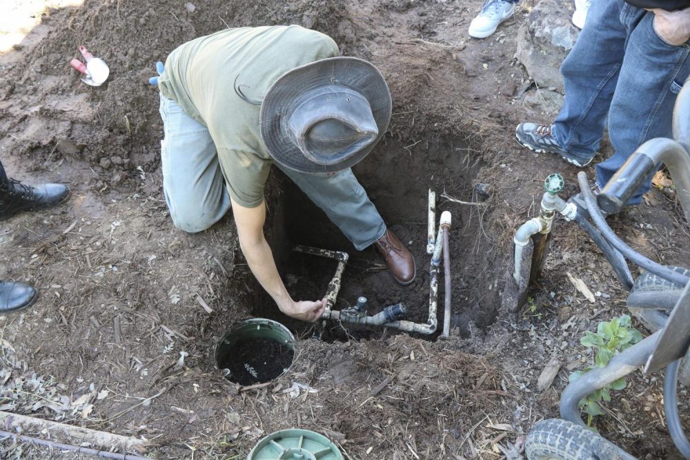 Horticulture major Nathan Caceres helps to rebuild a valve manifold during a Sustainable Landscaping Maintenance class (HORT 324) in the Horticulture Department at American River College on March 13, 2019. (Photo by Anthony Barnes)