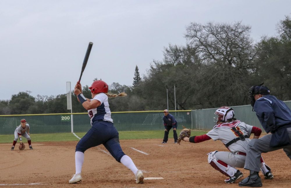 American+River+College+softball+outfielder+Kirsten+Cox+swings+and+misses+in+the+bottom+of+the+fifth+inning+against+Sacramento+City+at+ARC.+ARC+lost+7-1.+%28Photo+by+Irene+Jacobs%29